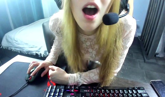 Russian blonde in home sex playing a computer game