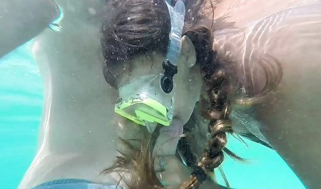 Nimble lover does Blowjob to a friend in the fresh air and under water